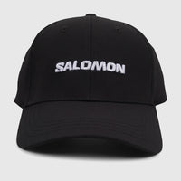 Front view of a black Salomon adjustable cap with the brand name 'SALOMON' embroidered in white across the front.