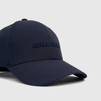 Navy blue Salomon Adjustable Cap SUC0592, made of technical fabric, shown from a front-side angle on a neutral background.