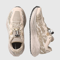 Salomon Aero Glide 4 GRVL women's sneakers in Tapioca Desert Tan, quick-lace system, textured sole, displayed in top and