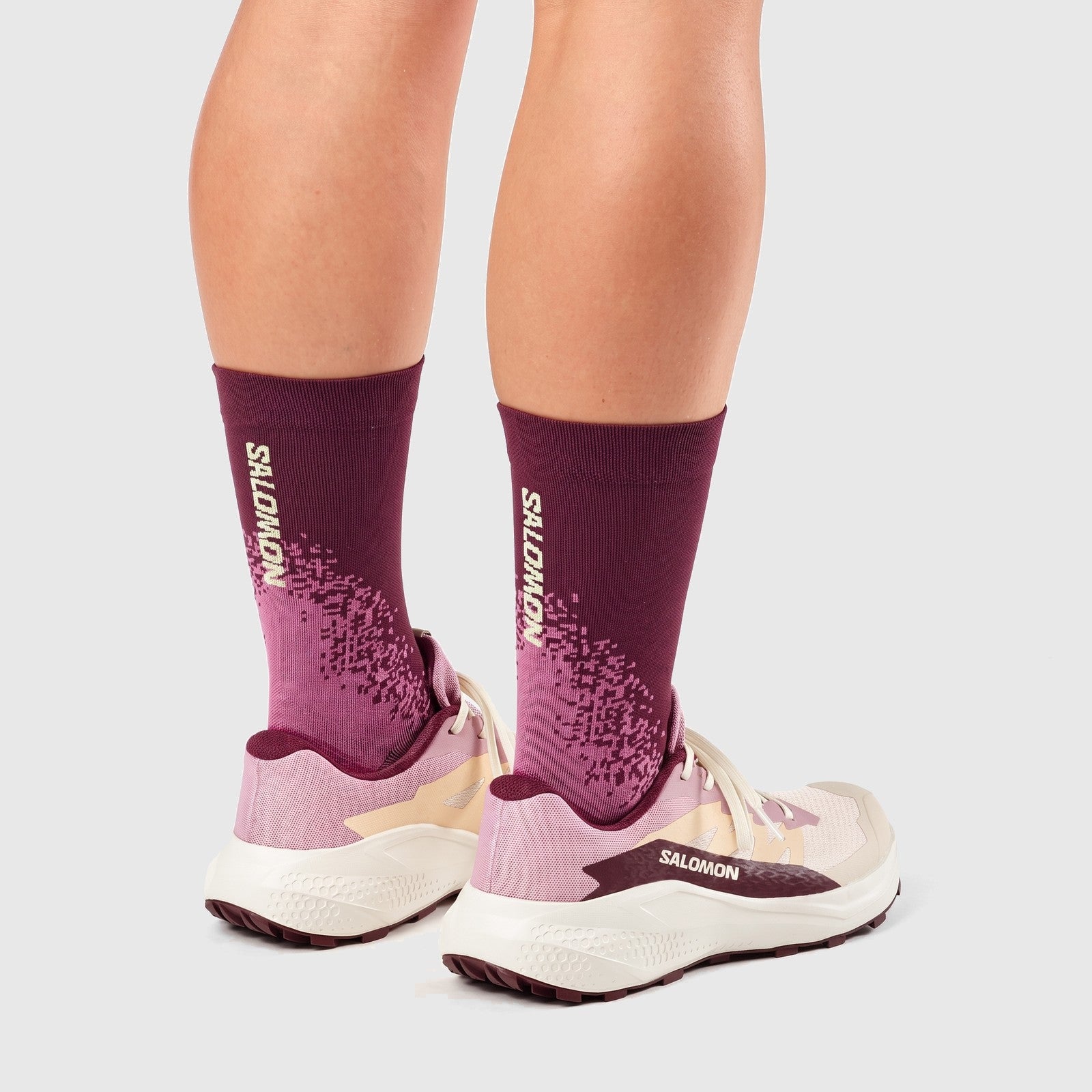 Salomon Ladies Sneaker Alphaglide W 490928 in tapioca and dawn pink, huckleberry accents, rear side view.