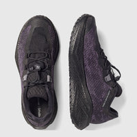 Salomon Men's Aero Glide 4 GRVL sneakers in black and purple, shown from top-down and side views on a a white background.