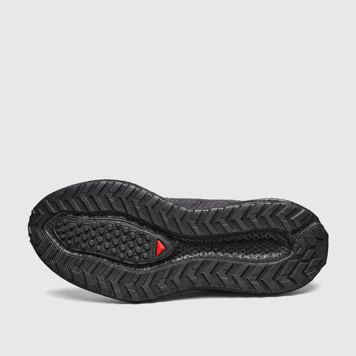 Black Salomon Men's Aero Glide 4 GRVL sneaker, sole view, showcasing the detailed Contagrip outsole tread pattern.