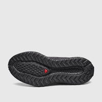 Black Salomon Men's Aero Glide 4 GRVL sneaker, sole view, showcasing the detailed Contagrip outsole tread pattern.