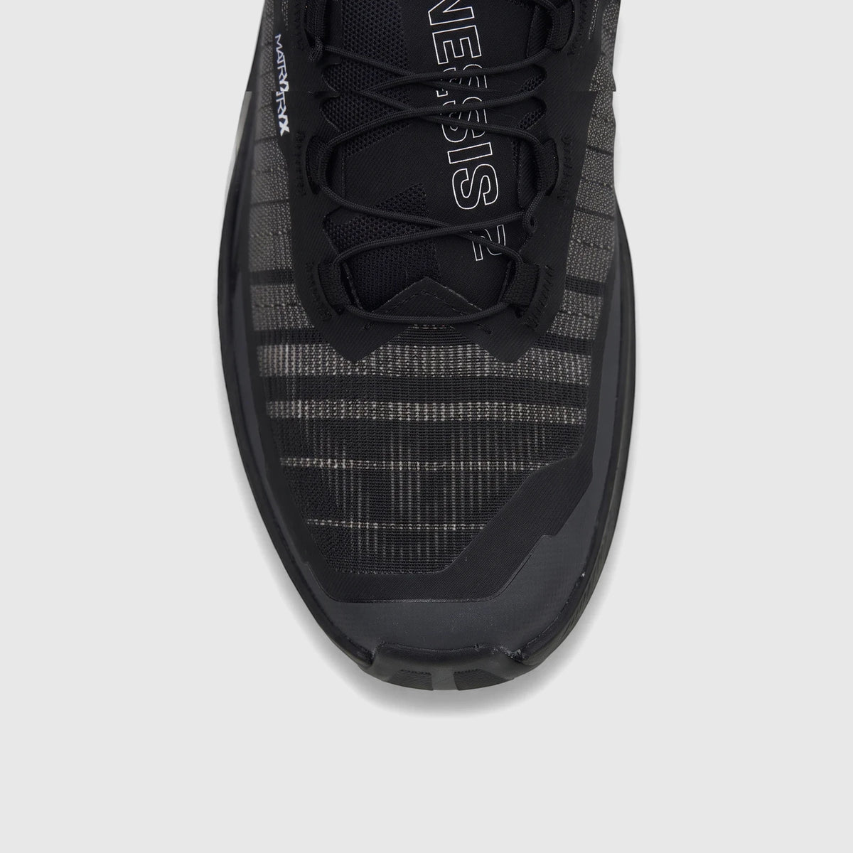 Close-up top view of the black and white Salomon Men's Sneaker Genesis 2, highlighting the toe box and quick lacing system