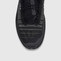 Close-up top view of the black and white Salomon Men's Sneaker Genesis 2, highlighting the toe box and quick lacing system