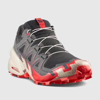 Salomon Men's Speedcross 6 sneakers in black, fiery red, and almond milk, shown in a low-angle side view on a white