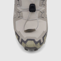 Close-up front view of Salomon Men's Speedcross 6 sneaker in silver cloud, paloma, and slate green colors.