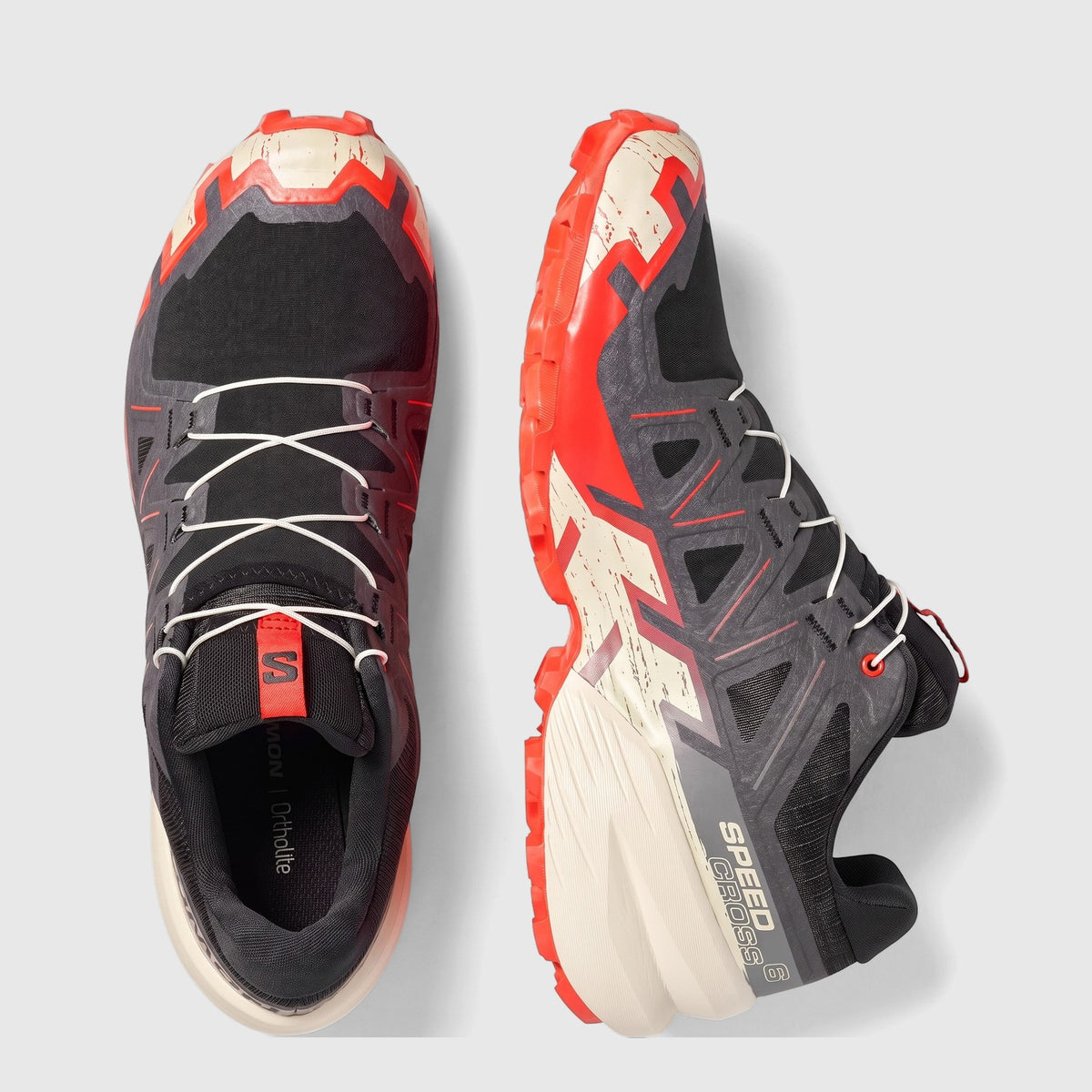 Salomon Men's Speedcross 6 trail running sneakers in black, fiery red, and almond milk, shown from top and side views.