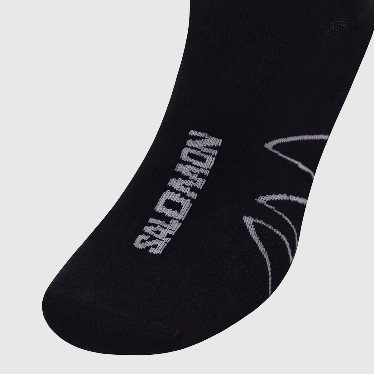 Black Salomon Men's Xa Sonic Sock with gray logo detail, made of knit fabric, shown from a close-up view.