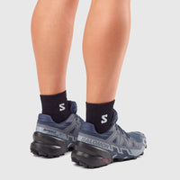 Salomon Speedcross 6 W ladies sneaker in spellbound blue and black, rear view with lugged trail outsole.