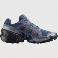 Salomon Speedcross 6 W ladies sneaker in spellbound blue and black, side view with rugged trail outsole.