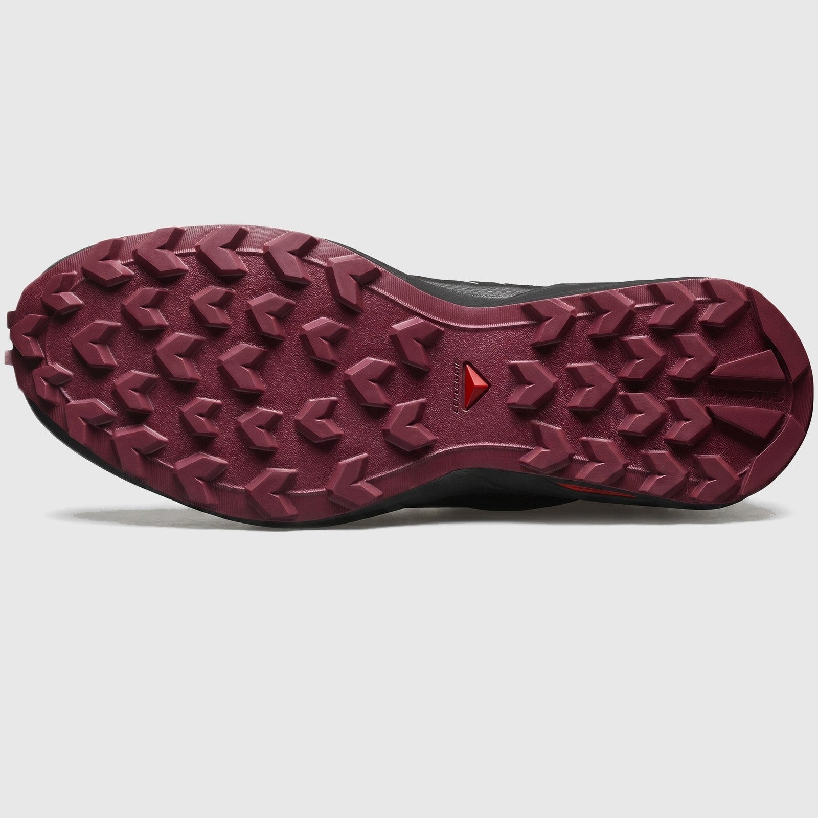 Salomon Speedcross Peak W ladies sneaker, bottom view showing burgundy lugged rubber outsole tread.