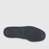 Underside view of a dark grey Sebago Men's Docksides Portland boat shoe, showing the sole with wavy traction pattern.
