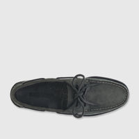 Overhead view of a single Sebago Men's Docksides Portland Nubuck boat shoe in total dark grey with tied laces and white