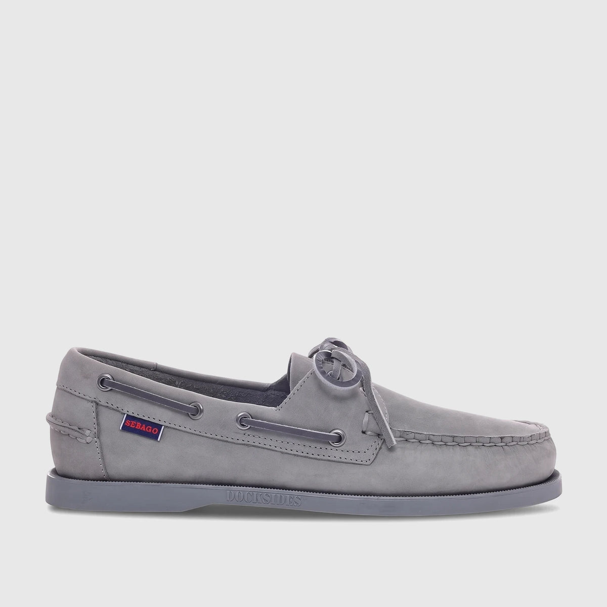 Men's Sebago Docksides Portland boat shoe in total mid-grey nubuck leather, viewed from the side with intricate lacing