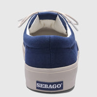 Rear view of a Sebago Men's Sneaker AL 75131SW 908 in blue navy canvas with white laces and an off-white sole.