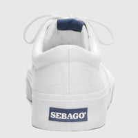 Rear view of a Sebago Men's AL 75131SW 911 white canvas sneaker with blue logo detail on the heel.