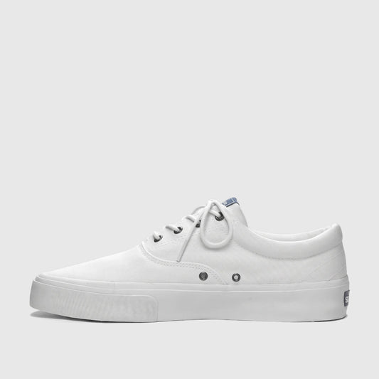 White canvas men's Sebago sneaker, style AL 75131SW 911, with white laces and a thick white sole, shown from a side view.