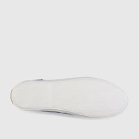 Bottom view of a blue Sebago Unisex Boat Shoe Pascal, showcasing its white rubber sole with a wavy grip pattern and brand