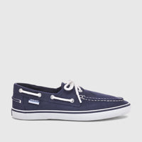 Sebago Unisex Boat Shoe Pascal in navy blue canvas with white laces, a white sole, and a side logo. Side view.