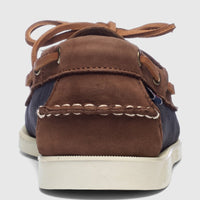 Rear view of a single Sebago Women Portland Archive A53 boat shoe in navy blue and brown leather with white stitching and
