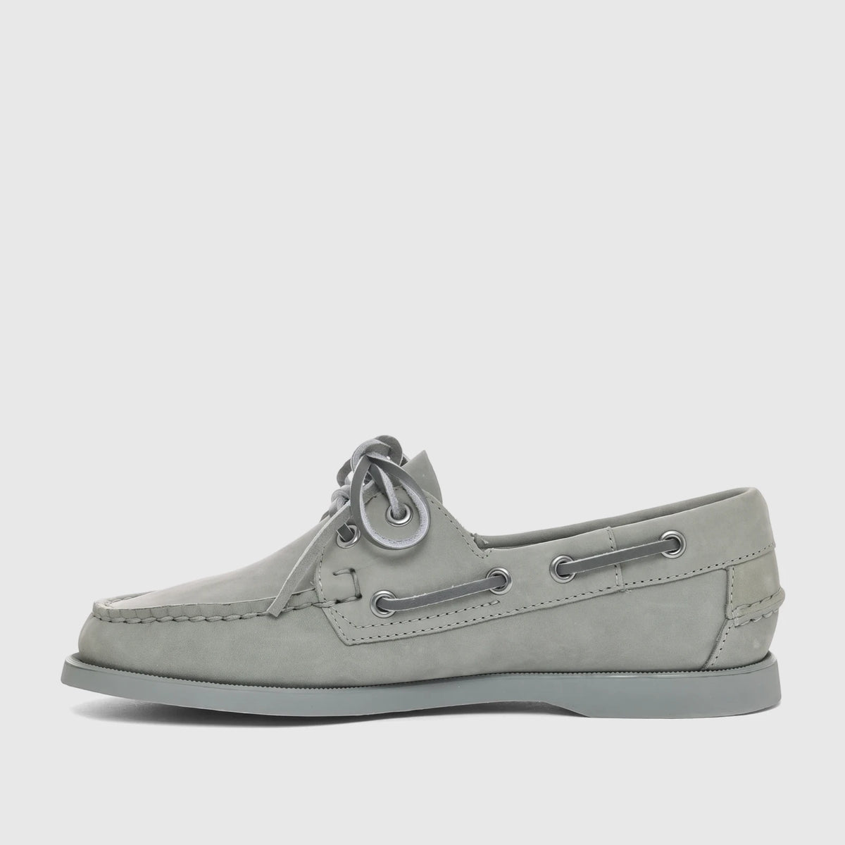 A single mid-grey nubuck Sebago Women Portland boat shoe with laces and a flat sole, presented in a side view.