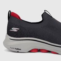 Skechers Go Walk 7 Men's Comfort Slip On Sneaker in charcoal black, showcasing knitted upper and cushioned sole from a side