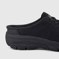 Skechers Ladies Comfort Open Back Easy Going black sneaker, showing the side profile of the heel and midfoot with mesh upper