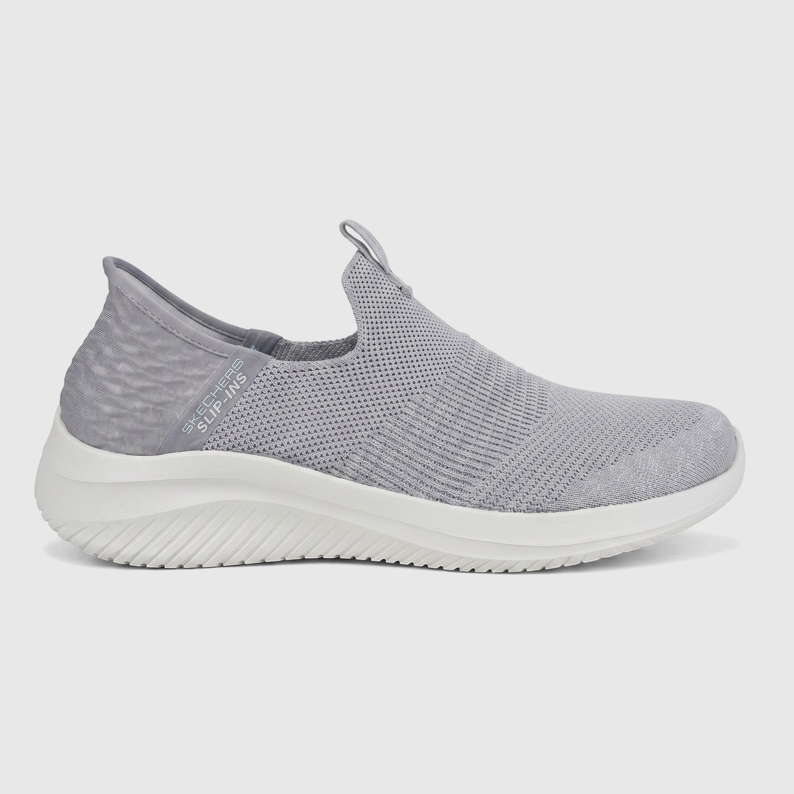Side view of a Skechers Ladies Comfort Slip Ins Sneaker Ultra Flex 3.0 in light grey knit mesh with a white sole.