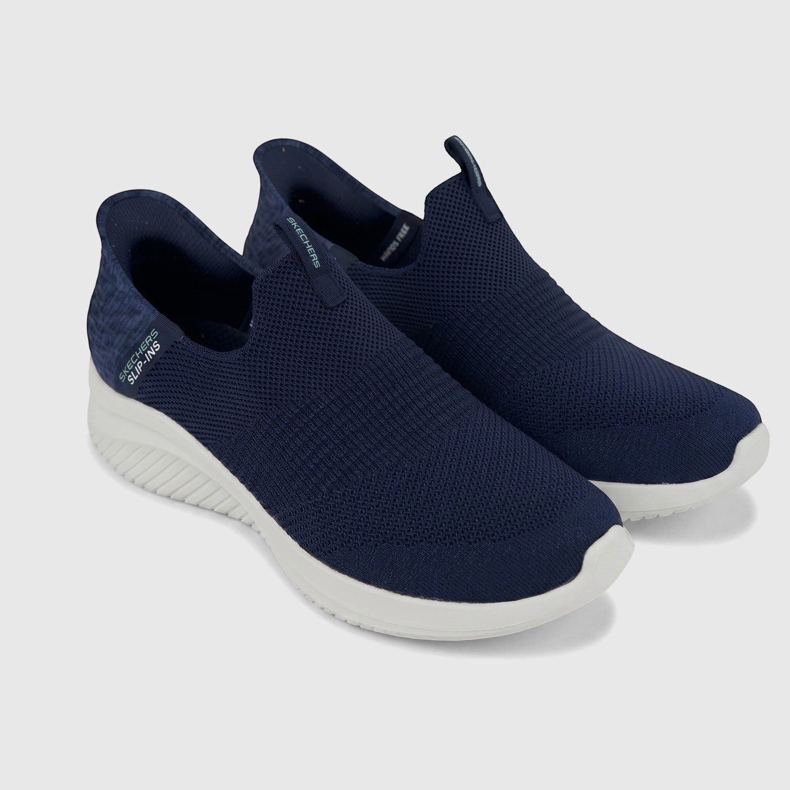A pair of Skechers Ladies Comfort Slip Ins Sneaker Ultra Flex 3.0 149709 in navy blue with a knit upper and white sole,