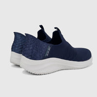 A pair of navy Skechers Ladies Comfort Slip-Ins sneakers, Ultra Flex 3.0 149709, with a white sole, viewed from a rear-side