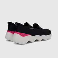 Skechers Ladies Comfort Slip On Sneaker Go Walk Massage Fit 124908 in black and hot pink, featuring a white wavy sole.