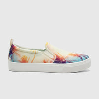 Skechers Ladies Comfort Slip On Sneaker Poppy 177996 Multi, featuring a vibrant palm tree print and a white platform sole,
