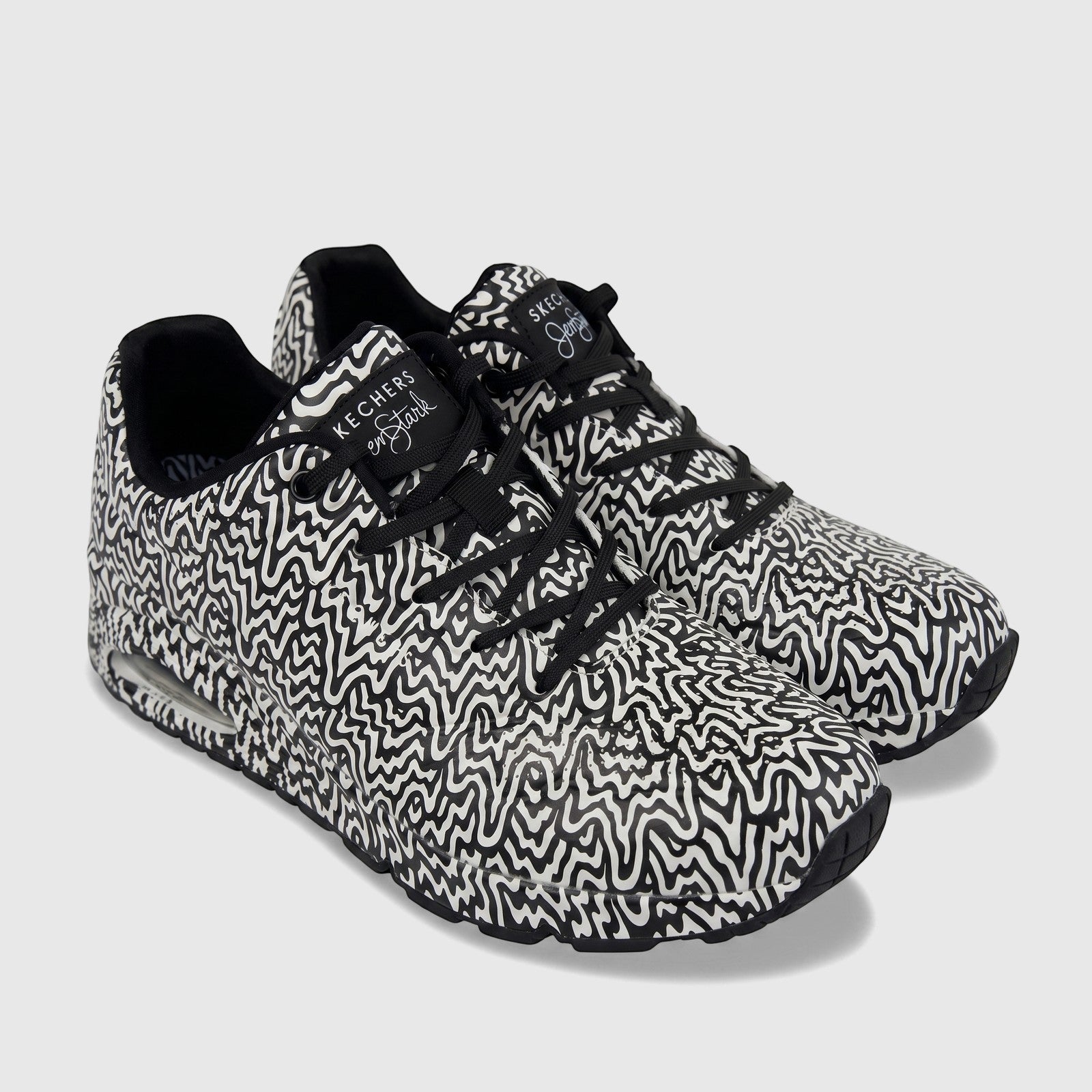 Skechers Ladies Comfort Sneaker Uno 177960 with a distinctive black and white abstract pattern and black laces.