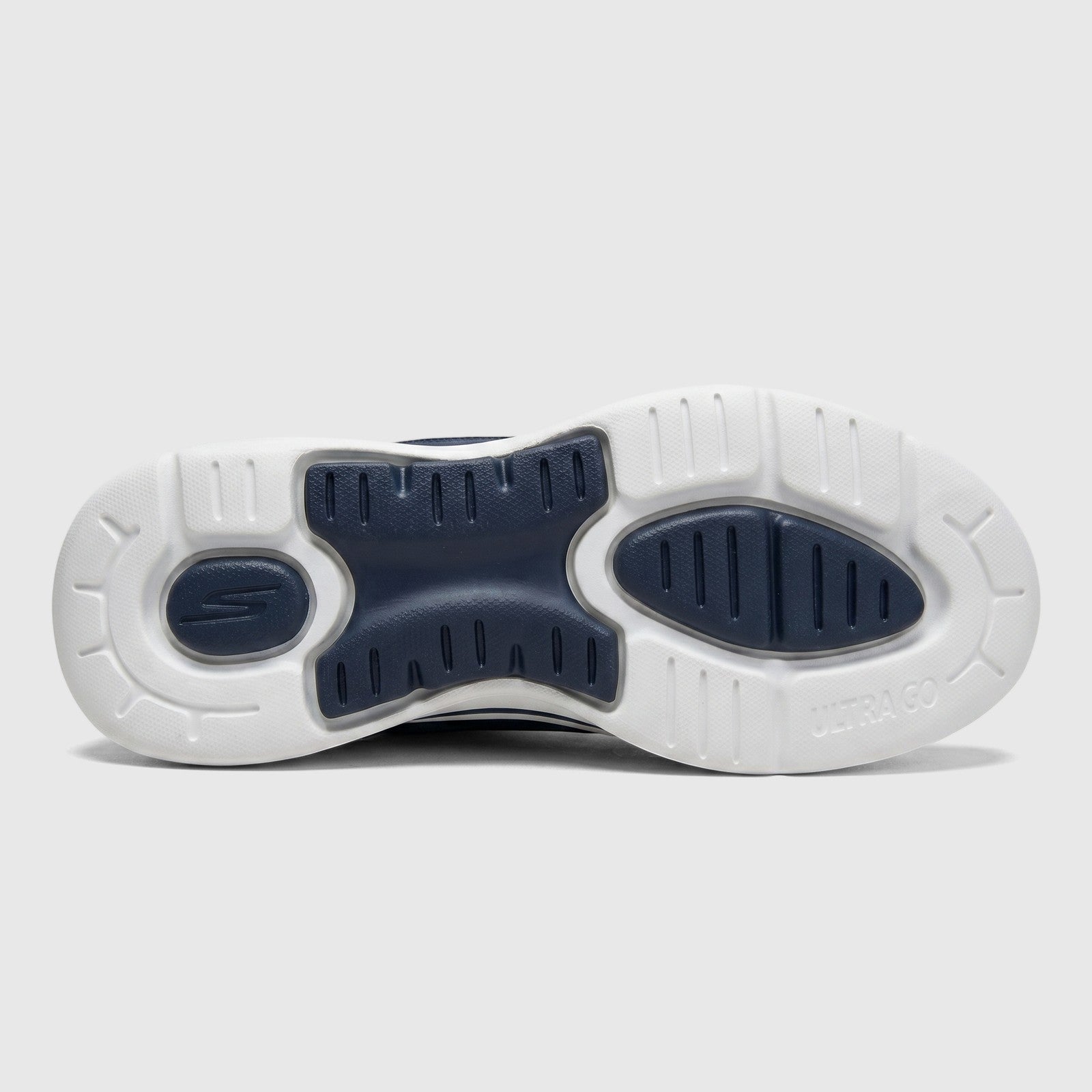Underside view of Skechers Ladies Slip Ins Comfort Sneaker Go Walk Arch Fit in navy and white, highlighting the sole.