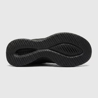 Black Skechers Ultra Flex 3.0 slip-on sneaker sole with textured grip pattern, shown from a side profile view.
