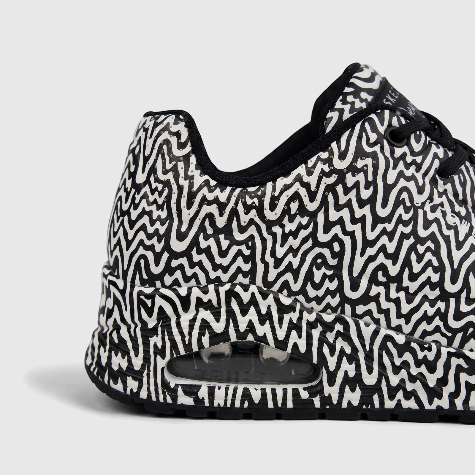 Skechers Ladies Uno 177960 Comfort Sneaker, black and white wavy pattern, detailed side profile view.