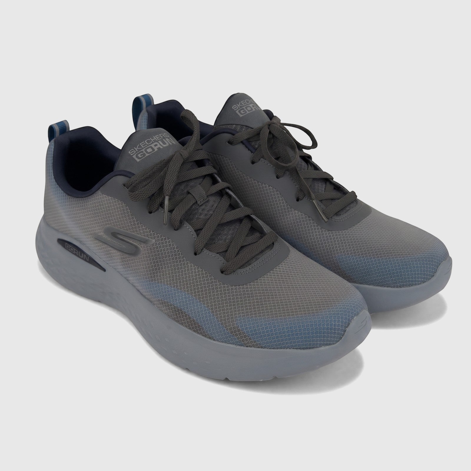 Pair of Skechers Go Run Lite men's comfort sneakers in charcoal blue, featuring mesh uppers and grey laces.