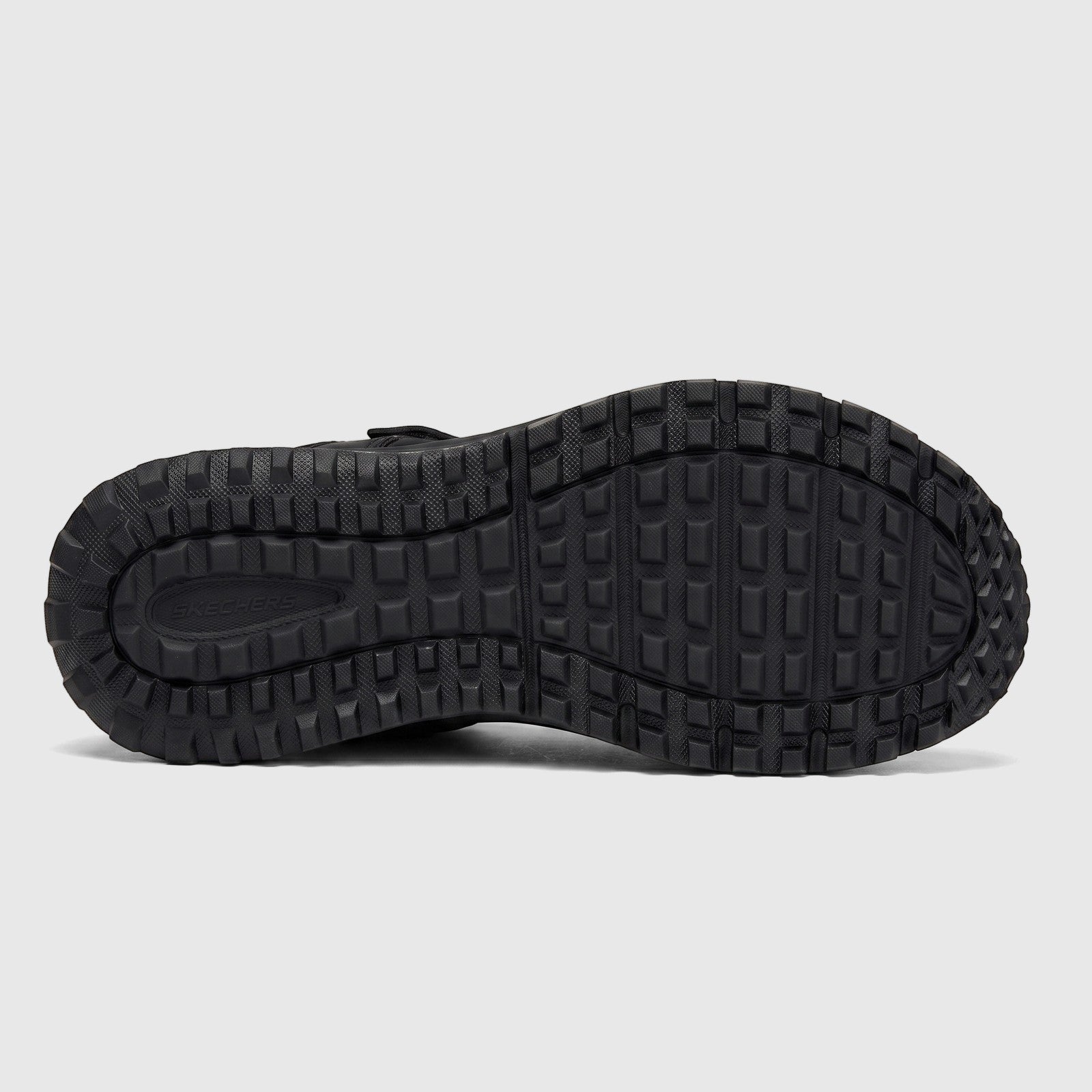 Bottom view of a black Skechers Men's Adventure Sandal Escape Plain Trail shoe sole with a textured tread pattern.