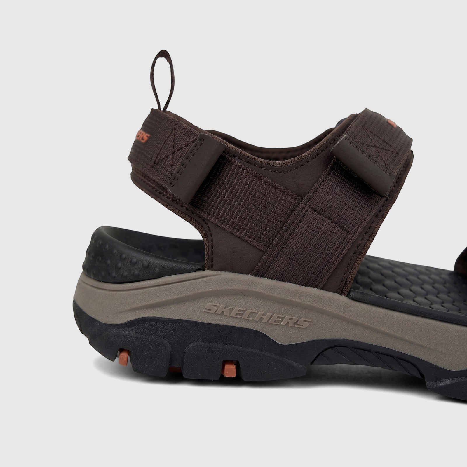 Side view of a Skechers Men's Adventure Sandal Tresmen in chocolate brown, featuring a durable strap system and a rugged