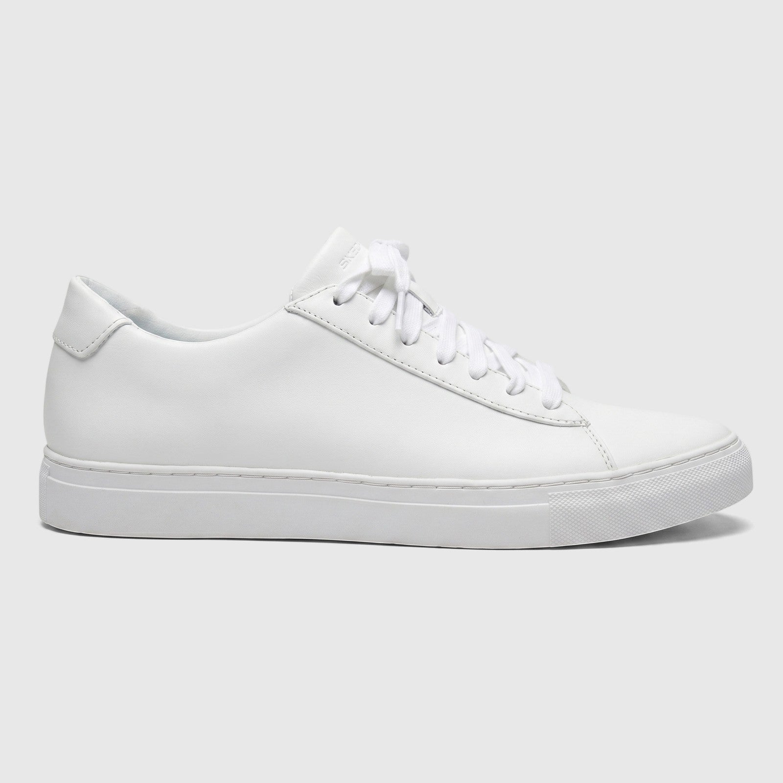 White Skechers Men's Comfort Arch Fit Legend sneakers, shown in a clean side profile.