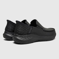 Rear three-quarter view of Skechers Men's Comfort Casual Slip-Ins Parson 204866 in black, showcasing the design and textured