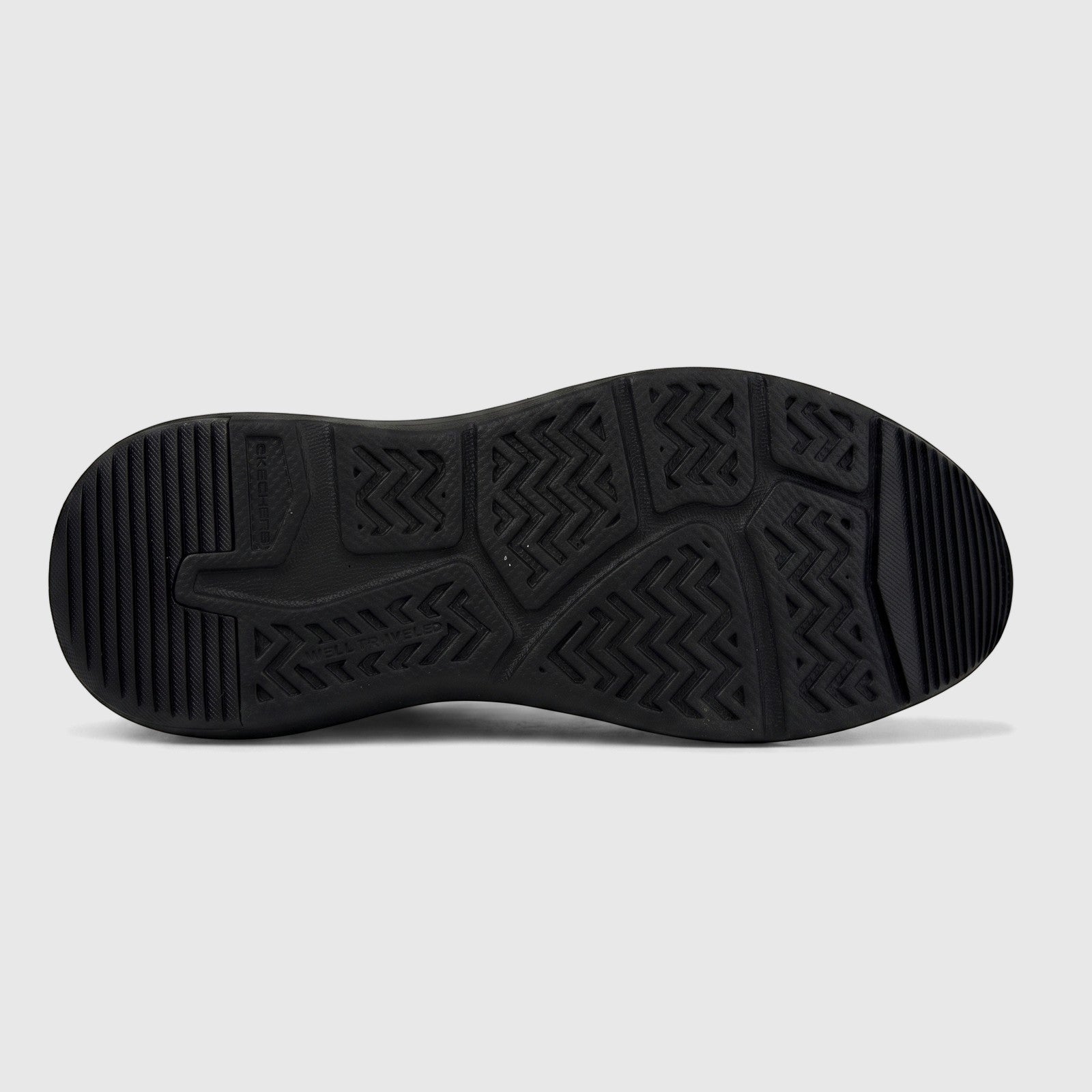 Bottom view of a black Skechers Men's Comfort Casual Slip-Ins Parson shoe sole, highlighting its durable tread pattern and