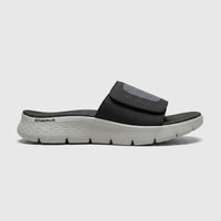 Skechers Men's Comfort Slide Go Walk Flex Sandal 229204 in black and light grey, shown from a side view.