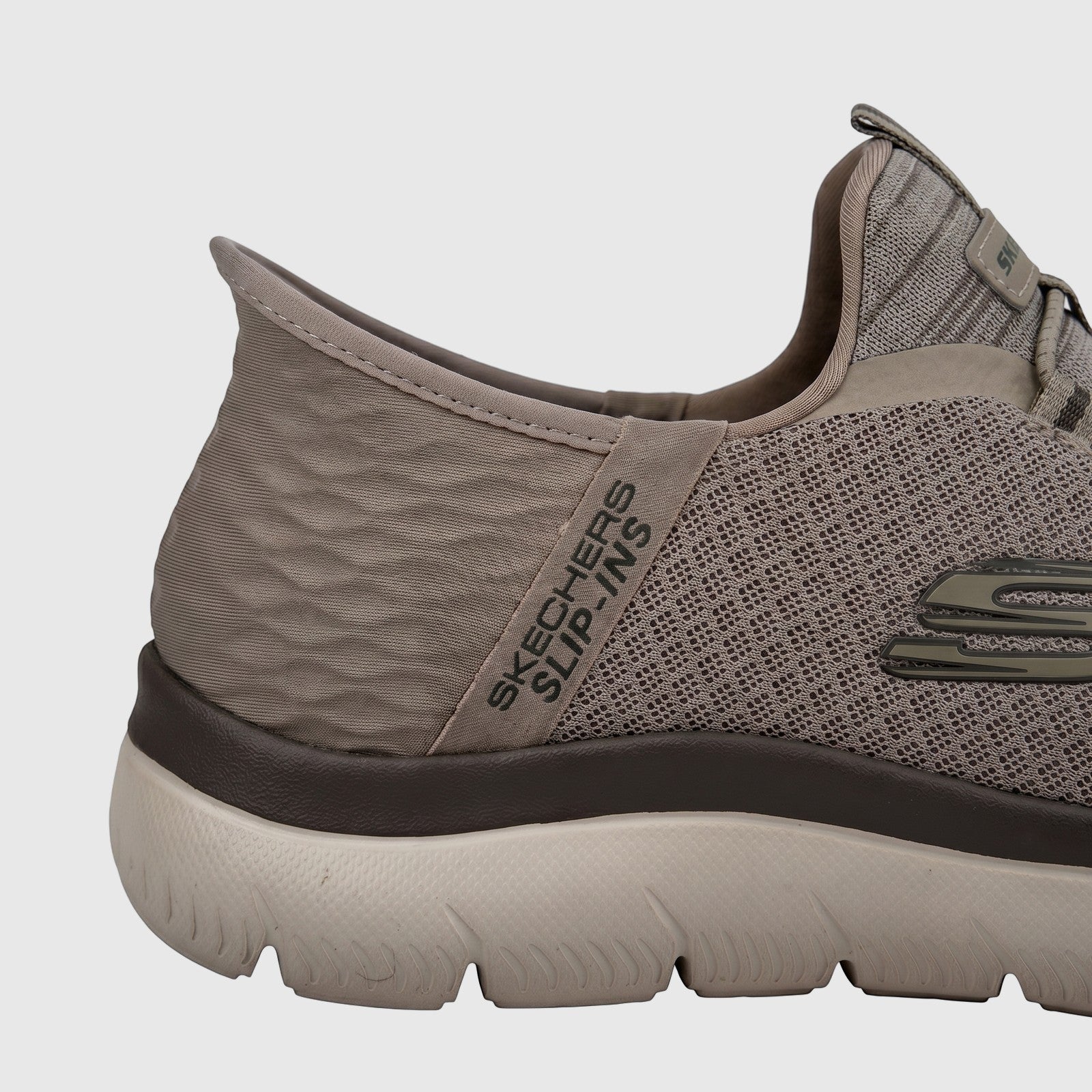 Close-up of a Skechers Men's Comfort Slip Ins Sneaker Summits 232457 in taupe mesh, side view.