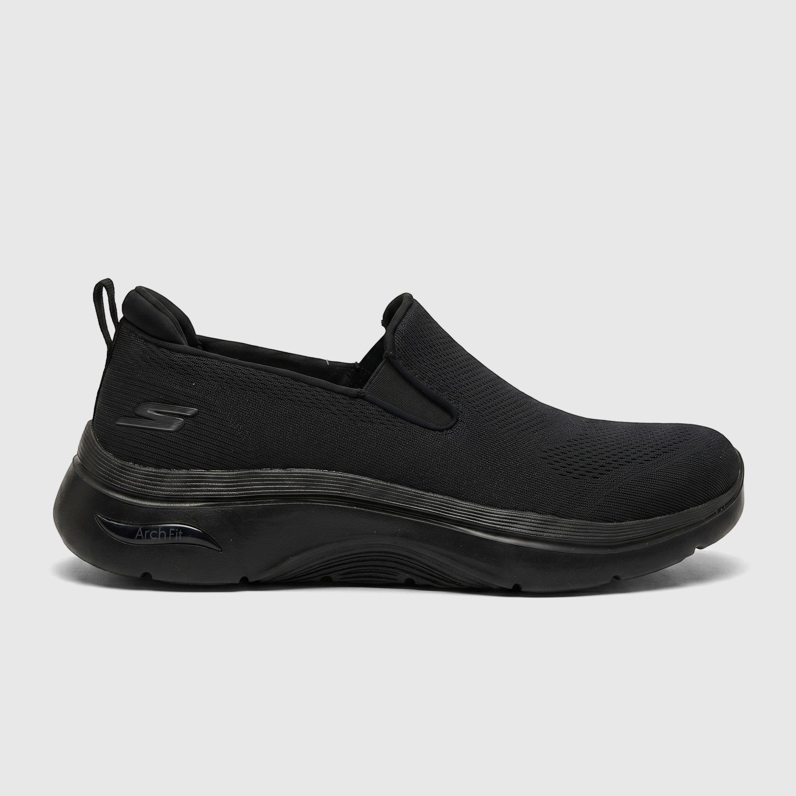 Black Skechers Men's Comfort Slip On Sneaker Go Walk Arch Fit 2.0 with mesh upper, shown in side profile.