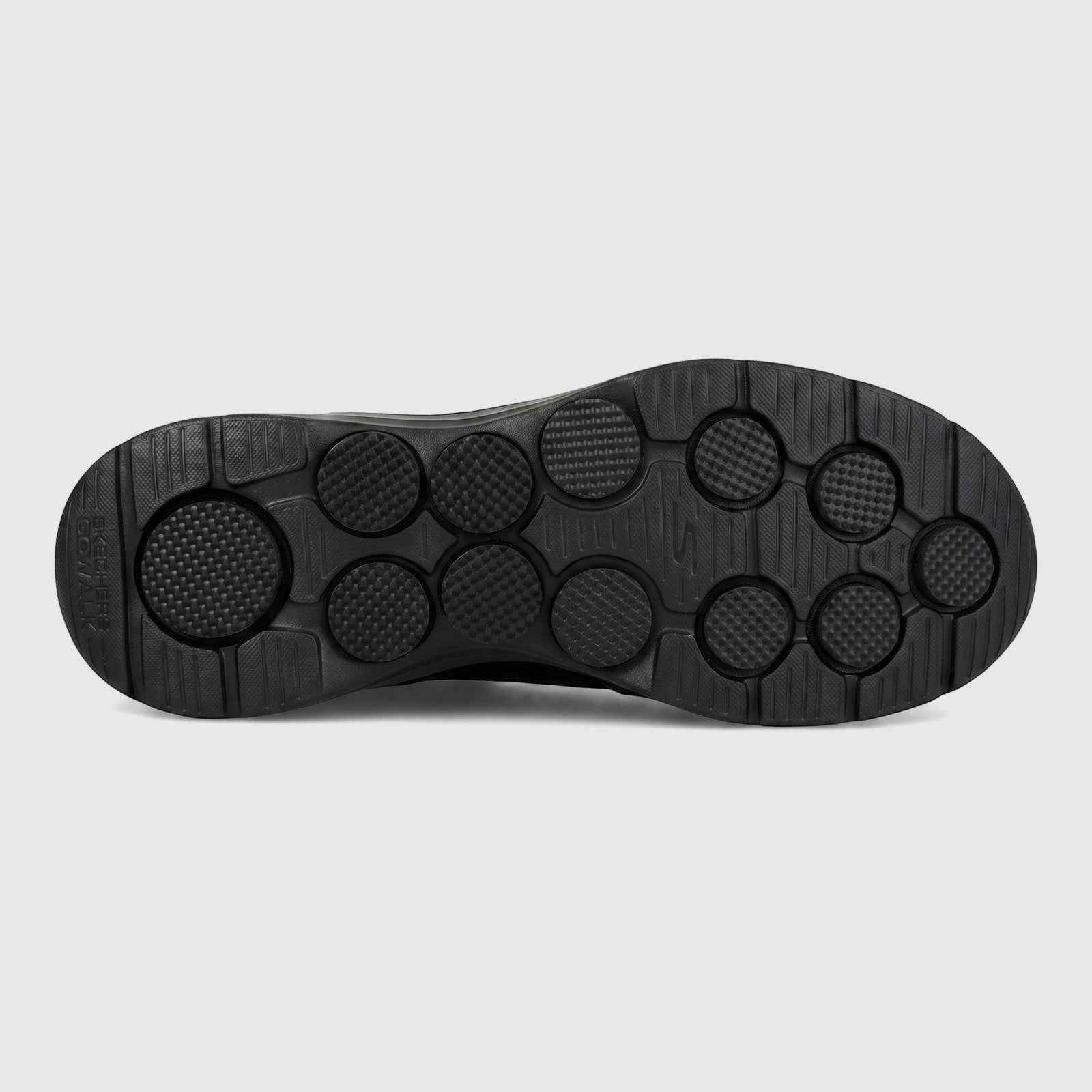 Black Skechers Men's Comfort Slip On Sneaker Go Walk 7, showing the durable, flexible sole with textured circular pods.