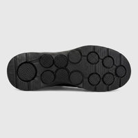 Black Skechers Men's Comfort Slip On Sneaker Go Walk 7, showing the durable, flexible sole with textured circular pods.