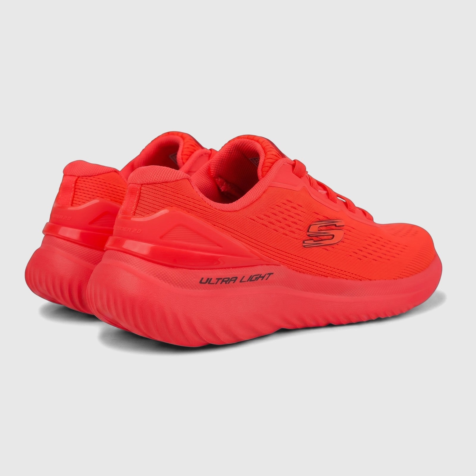 Skechers Men's Comfort Sneaker Bounder 2.0 in vibrant coral, seen from a side and rear angle.