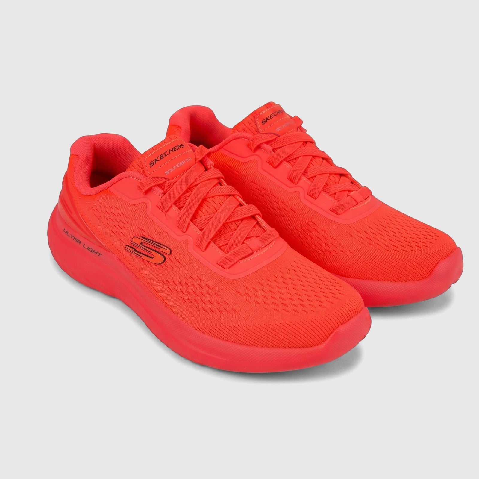 Skechers Men's Comfort Sneaker Bounder 2.0 in vibrant coral, featuring a breathable mesh upper and ultra-light design.